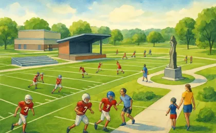 Illustration of a multi-field football complex at a city park with a small stadium and community activity.